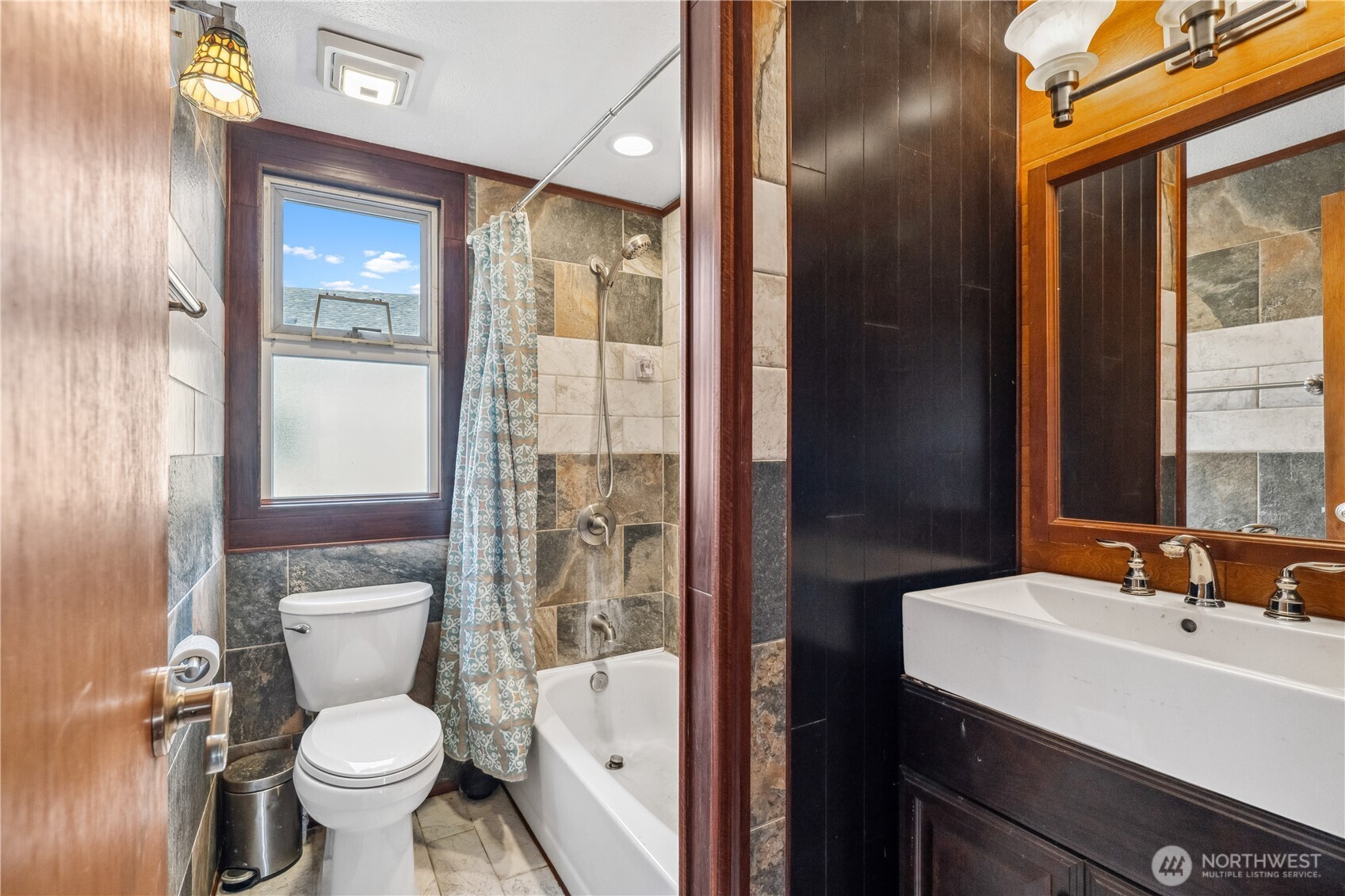 2113 East Grand Avenue Everett, WA 98201 - Photo 11 of 22 a bathroom with a sink toilet and shower