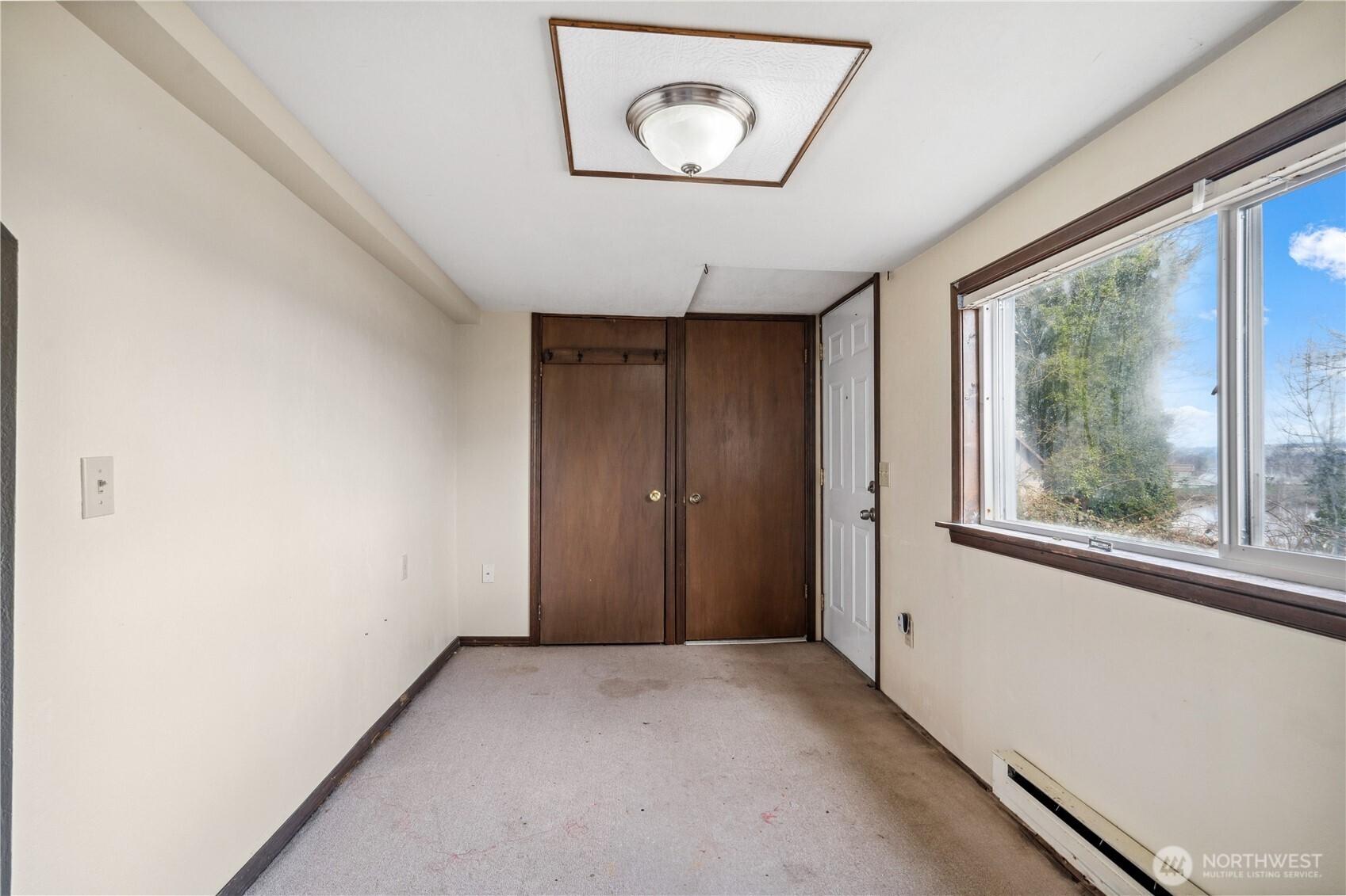 2113 East Grand Avenue Everett, WA 98201 - Photo 17 of 22 a view of an empty room with a window