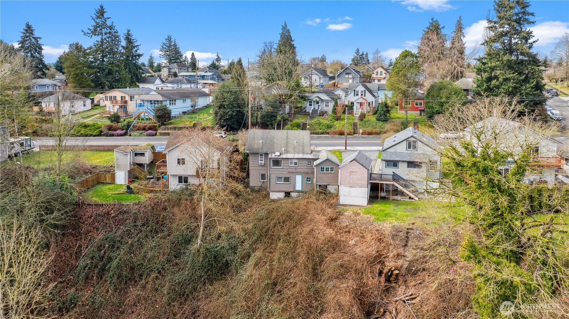2113 East Grand Avenue Everett, WA 98201 - Photo 21 of 22 a picture of houses with outdoor space