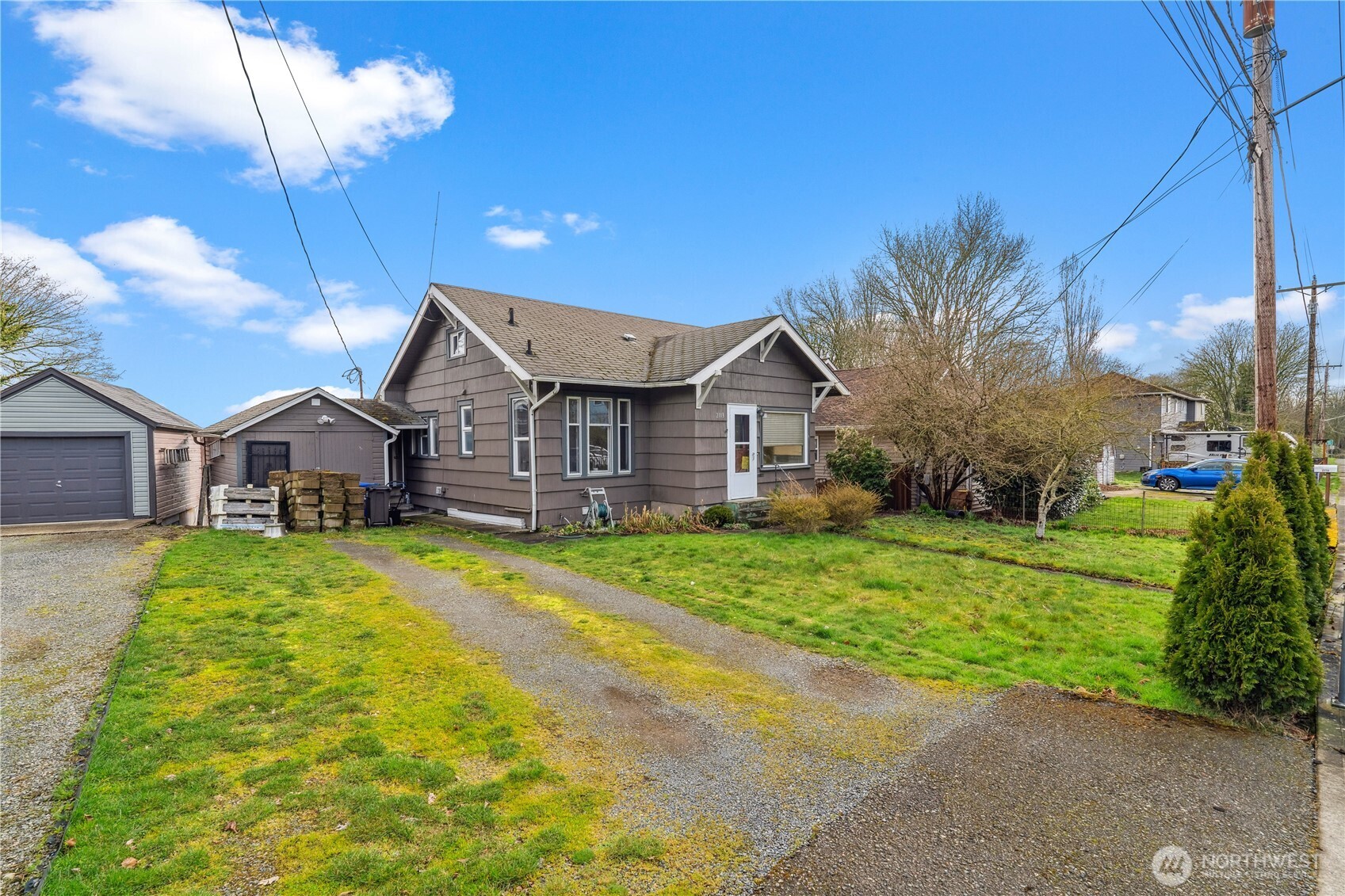 2113 East Grand Avenue Everett, WA 98201 - Photo 6 of 22 a front view of a house with a yard