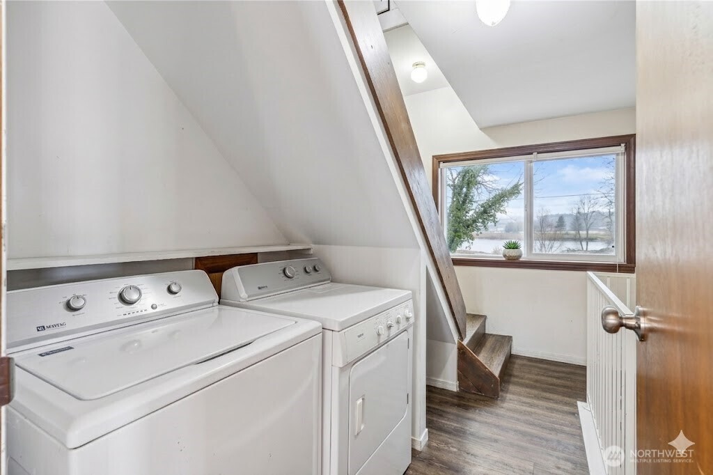 2113 East Grand Avenue Everett, WA 98201 - Photo 7 of 22 a view of washer and dryer with bathroom in the background