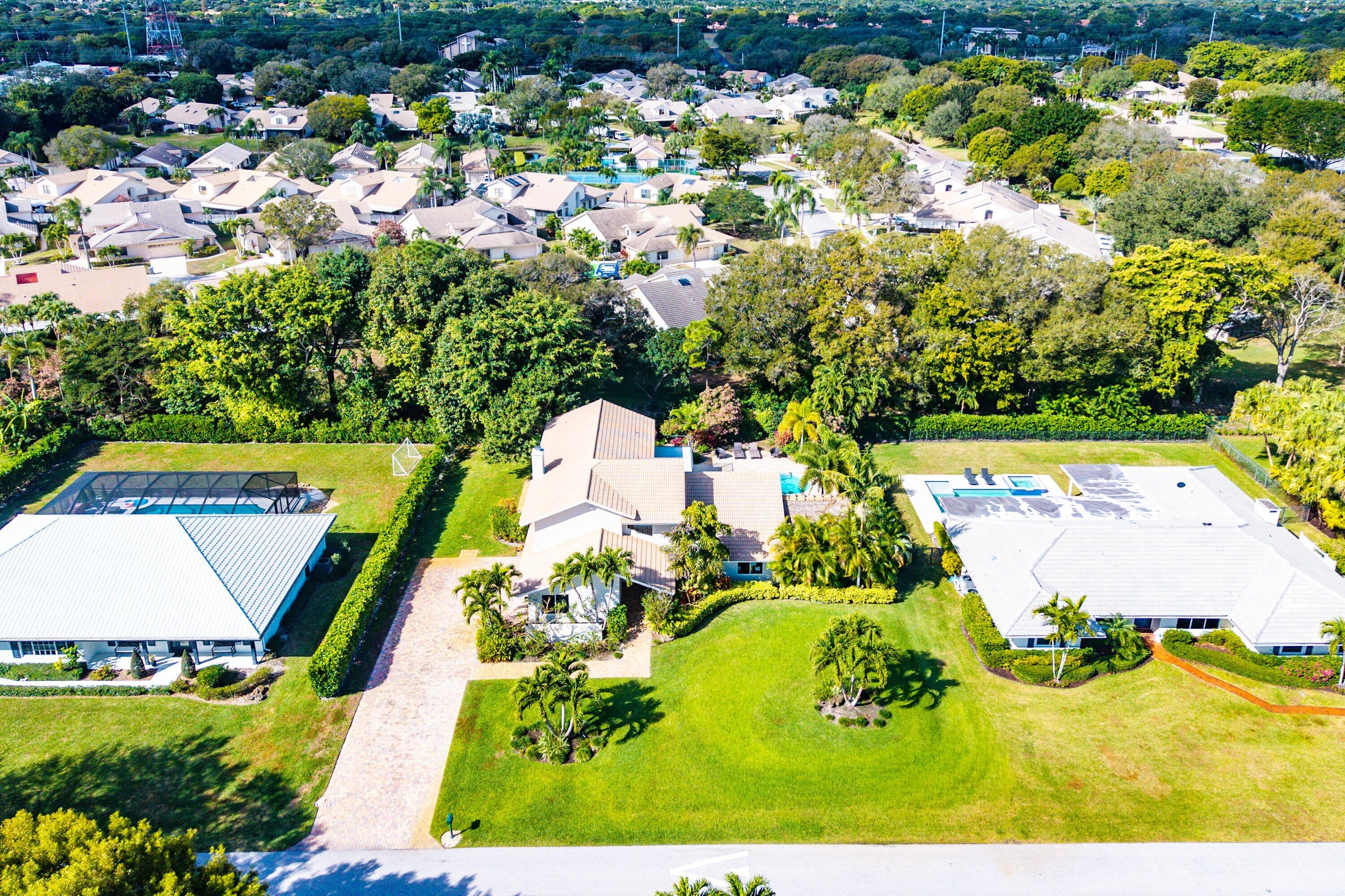 10893 Gleneagles Road Boynton Beach, FL 33436 - Photo 109 of 134 an aerial view of residential houses with outdoor space and swimming pool