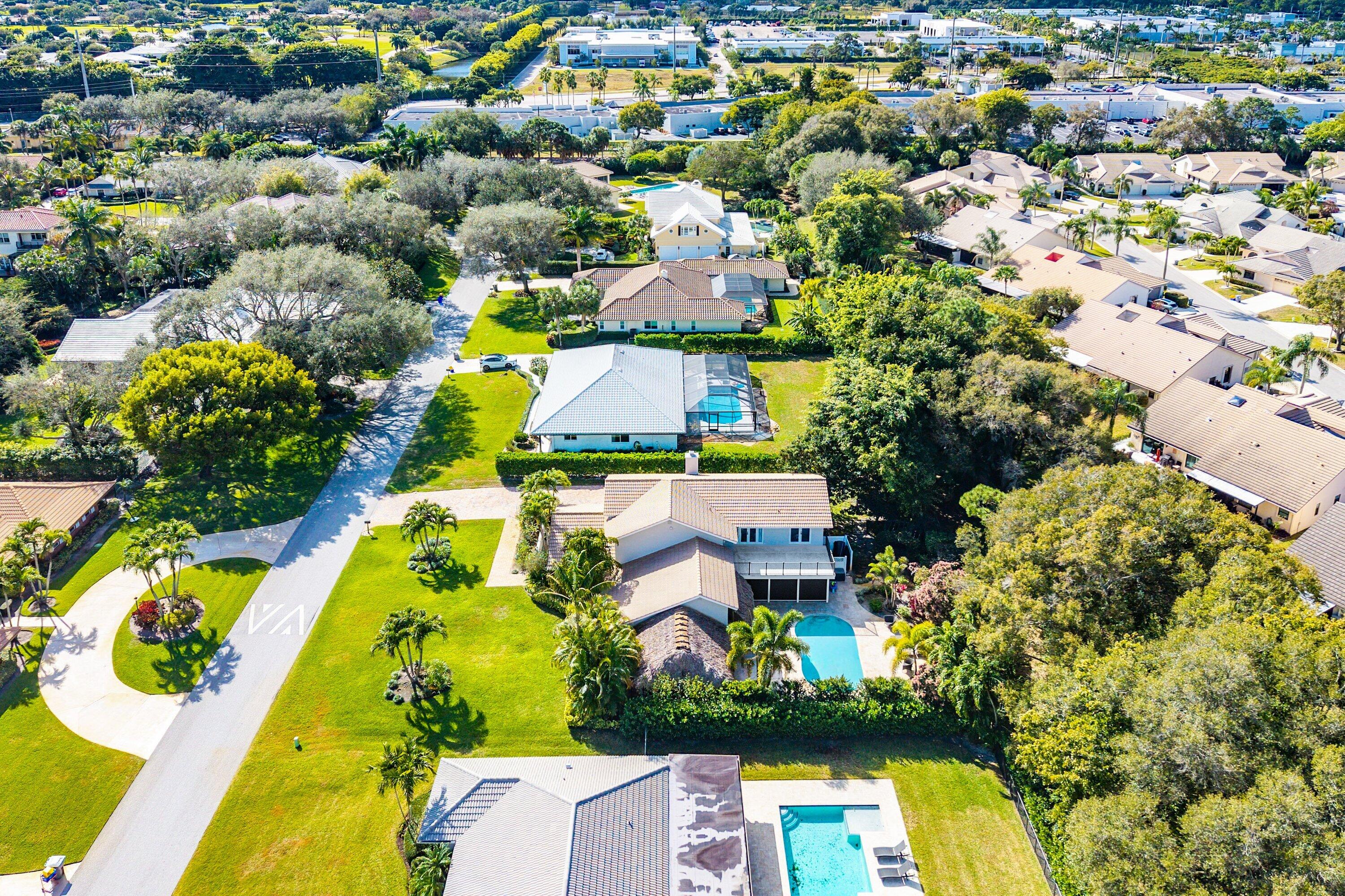 10893 Gleneagles Road Boynton Beach, FL 33436 - Photo 110 of 134 an aerial view of residential houses with swimming pool