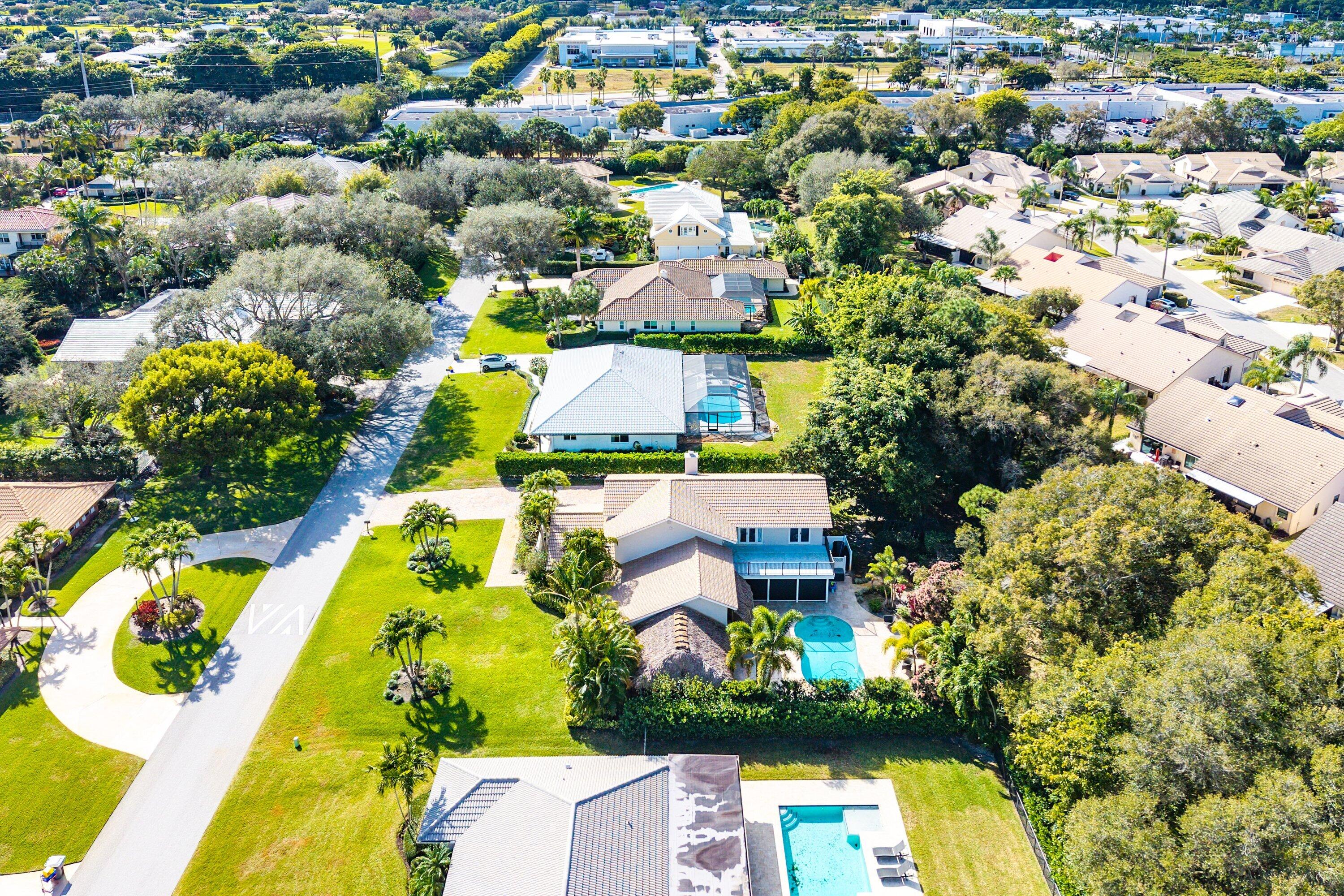 10893 Gleneagles Road Boynton Beach, FL 33436 - Photo 29 of 134 an aerial view of residential houses with swimming pool