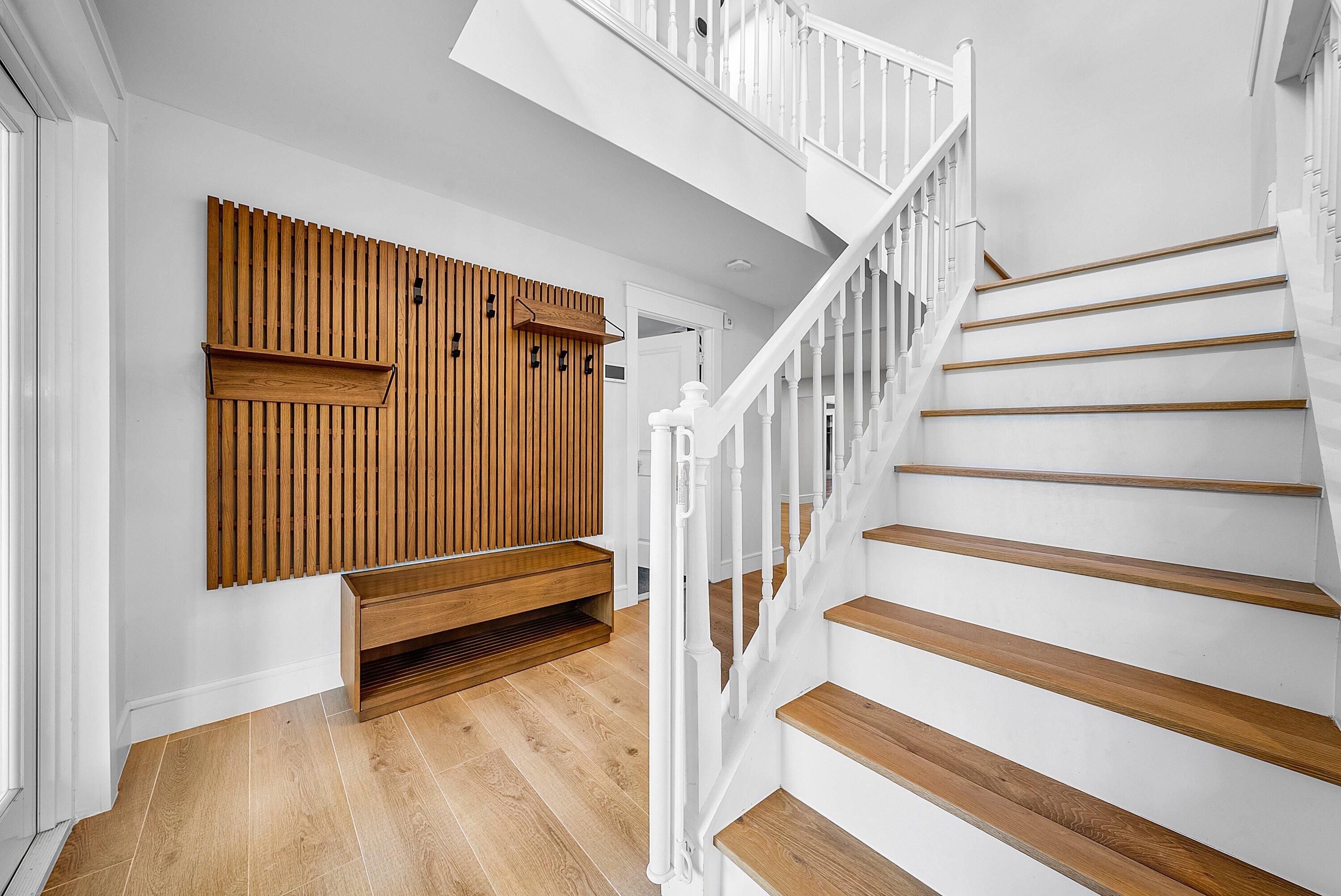 10893 Gleneagles Road Boynton Beach, FL 33436 - Photo 33 of 134 a view of entryway with wooden floor and stairs