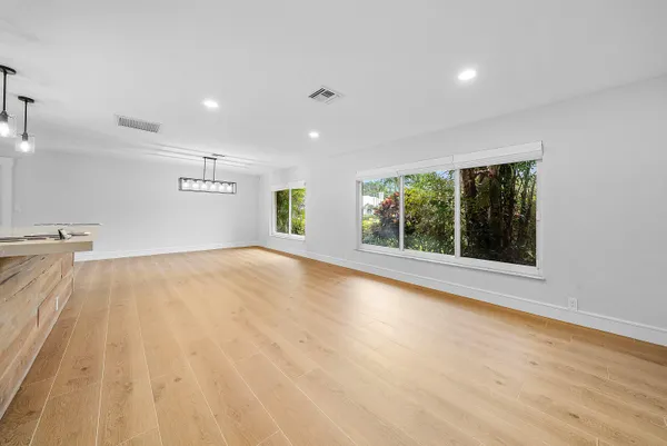 a view of house with garden space and street view