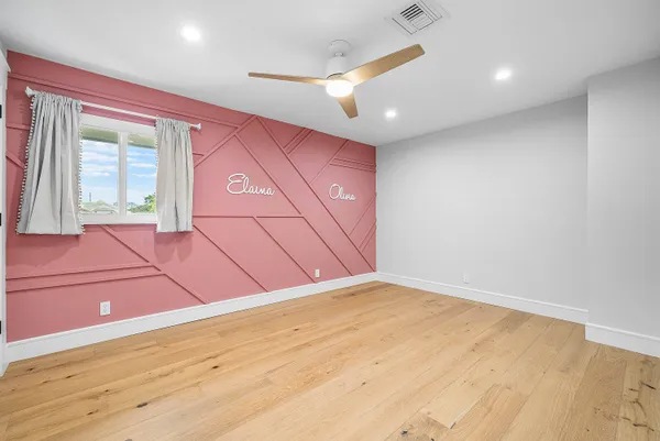 a view of a pathway with a yard