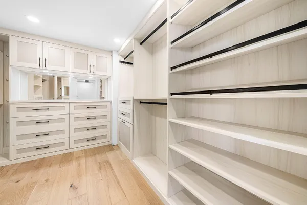 an aerial view of a house with garden space and street view