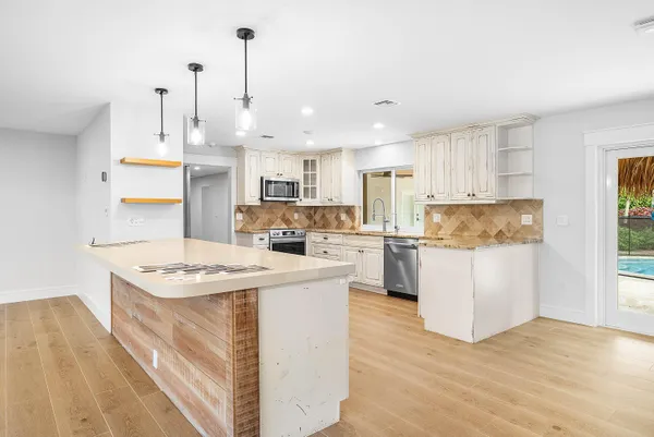 a view of a house with basketball court