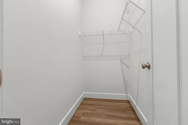 a view of a room with rack on the wall