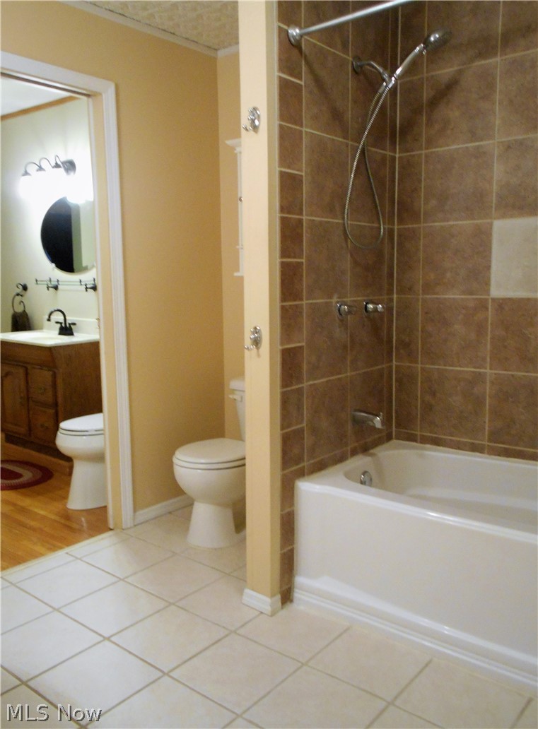 4370 School House Road Little Hocking, OH 45742 - Photo 22 of 35 Full/Main bathroom (pocket door separates this bathroom from the master bedroom half bath)