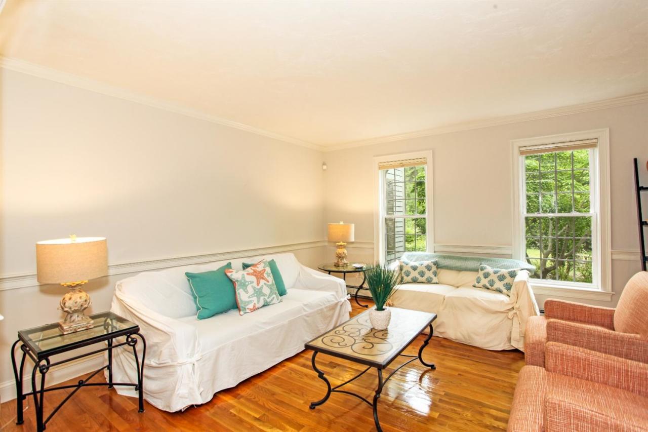693 Great Neck Road South Mashpee, MA 02649 - Photo 7 of 23 a living room with furniture and a window