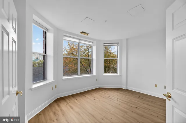 a bathroom with a sink a mirror and a shower