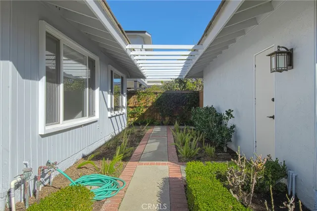 a view of swimming pool with a lounge chair