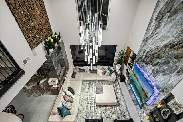 a view of living room with furniture and wooden floor