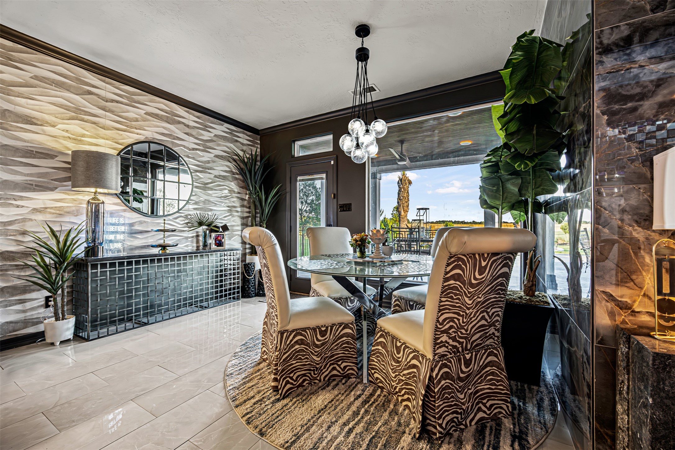 12345 White Oak Point Conroe, TX 77304 - Photo 18 of 50 a view of a patio with dining table and chairs with wooden floor