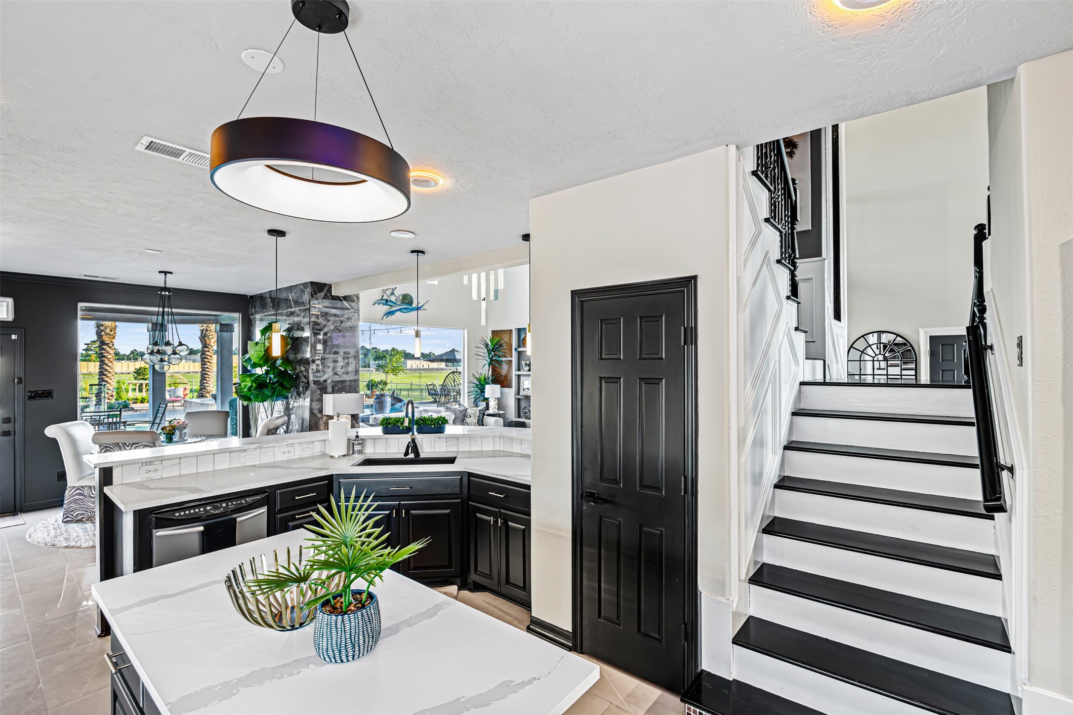 12345 White Oak Point Conroe, TX 77304 - Photo 21 of 50 a kitchen with a table and chairs