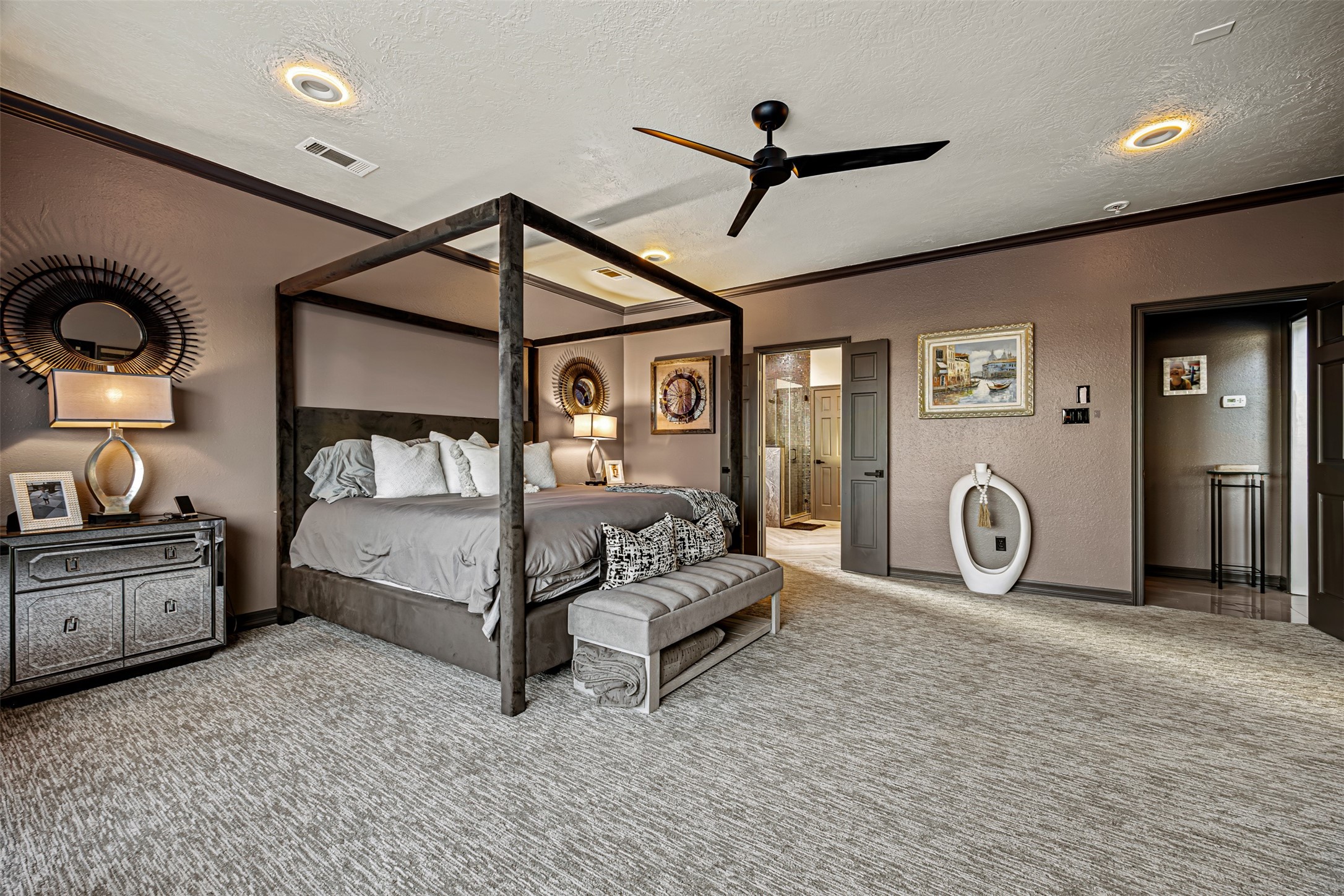 12345 White Oak Point Conroe, TX 77304 - Photo 24 of 50 a bedroom with a bed and a dresser