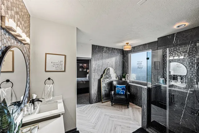 a view of a living room and bathroom