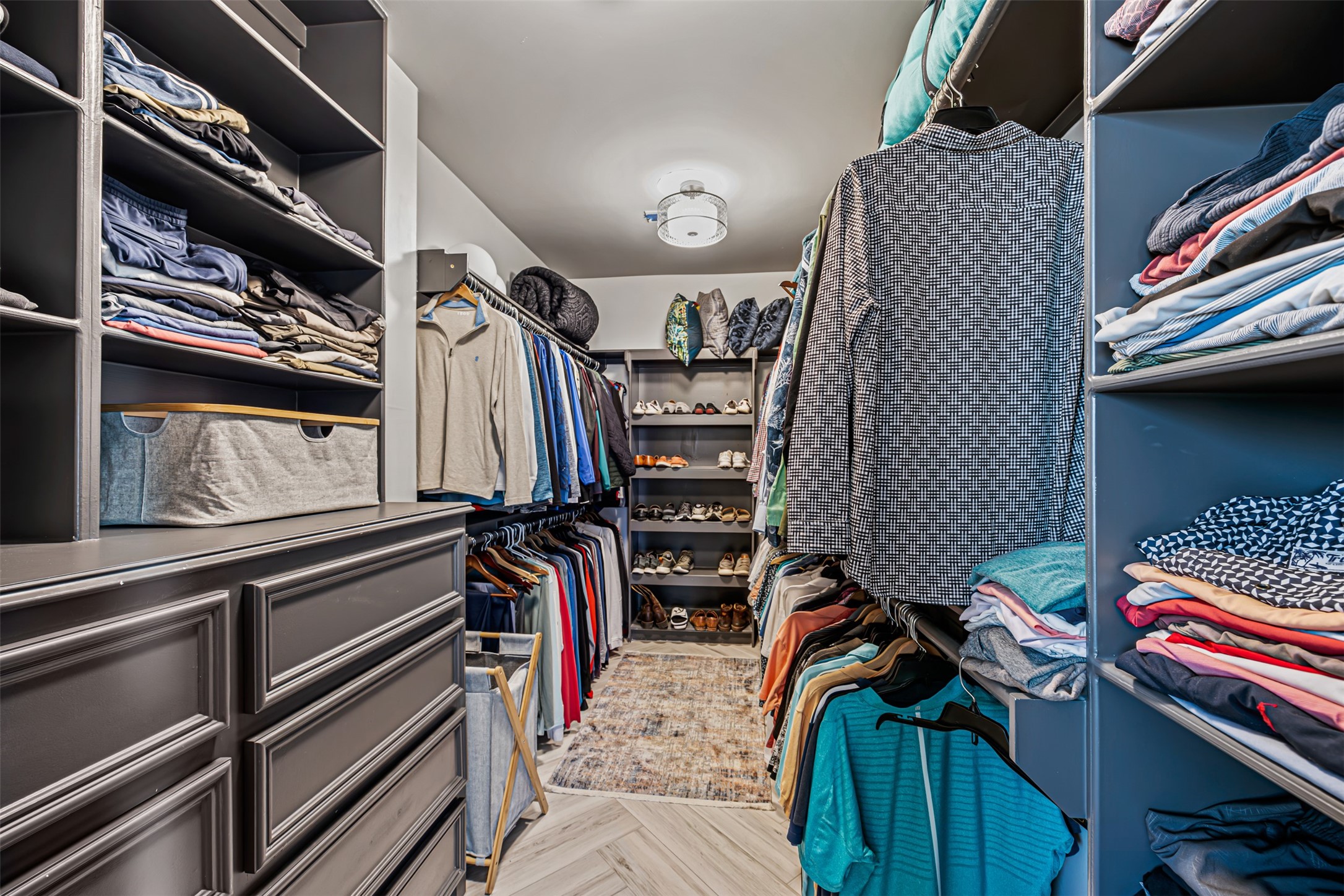 12345 White Oak Point Conroe, TX 77304 - Photo 27 of 50 a view of walk in closet with clothes