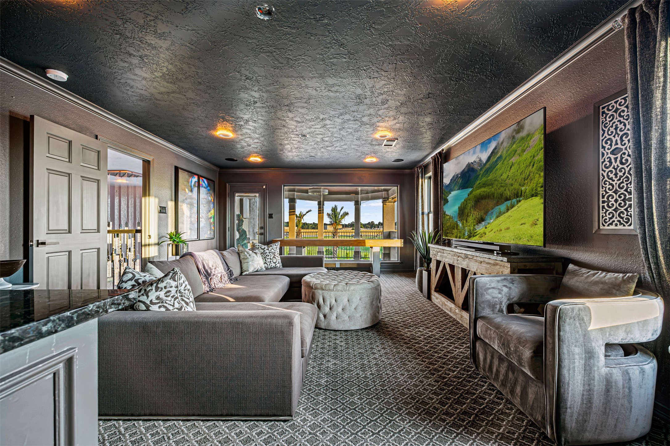12345 White Oak Point Conroe, TX 77304 - Photo 32 of 50 a living room with furniture and a flat screen tv