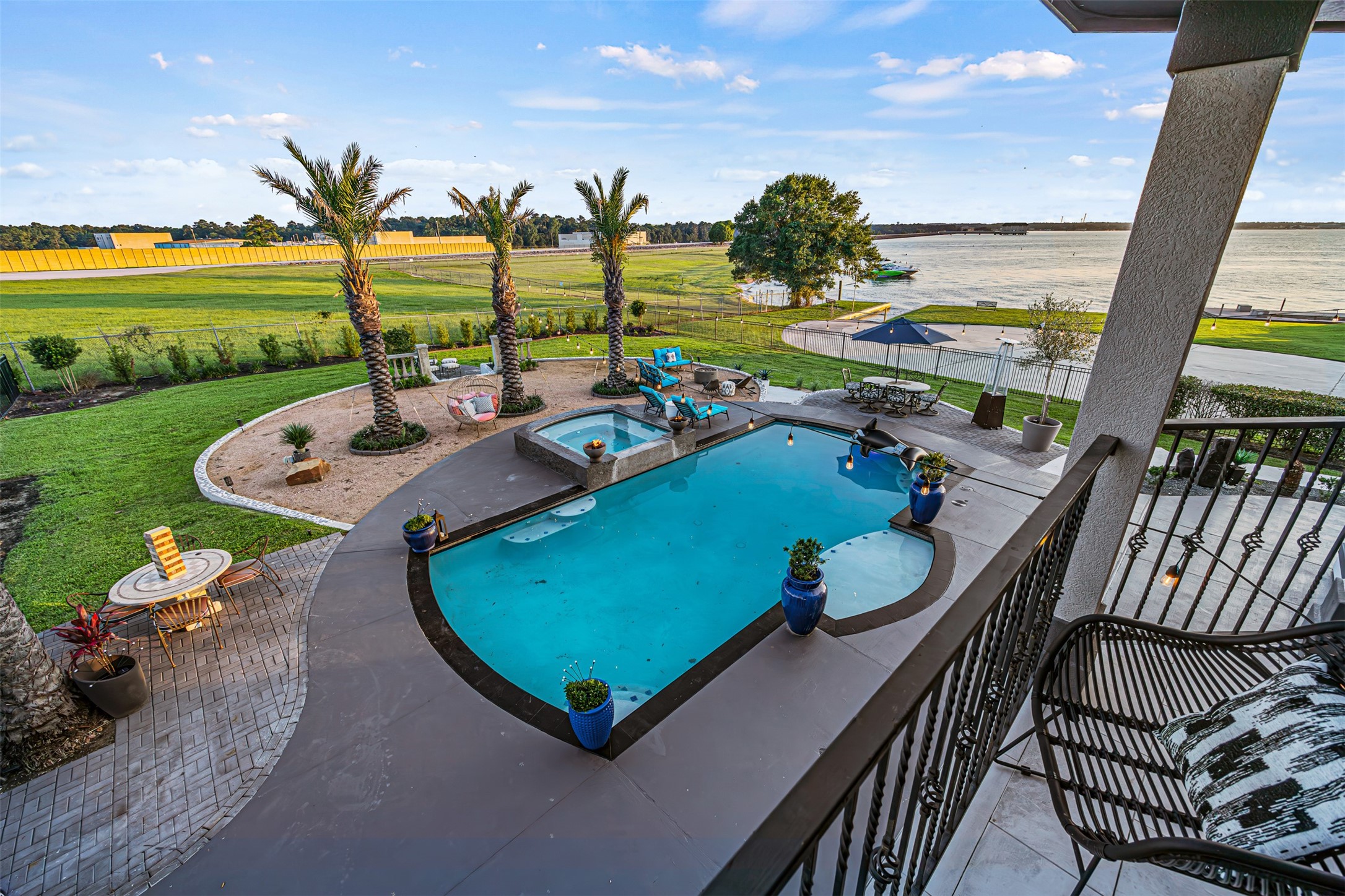 12345 White Oak Point Conroe, TX 77304 - Photo 39 of 50 a view of a swimming pool with furniture