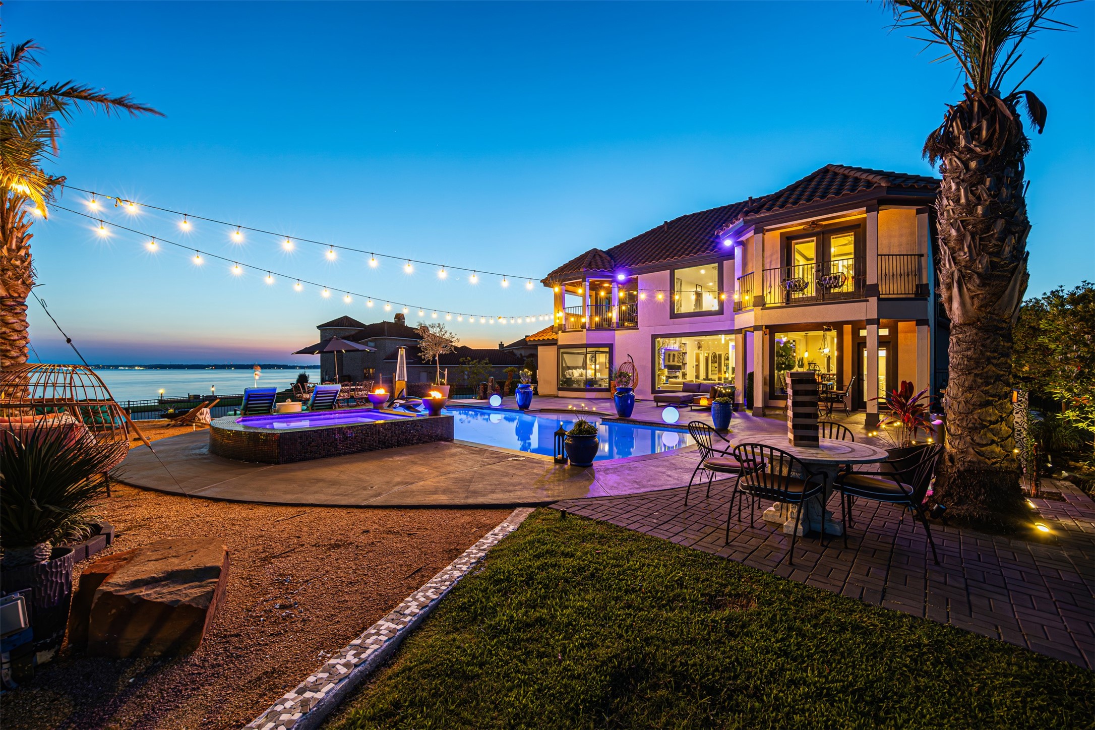 12345 White Oak Point Conroe, TX 77304 - Photo 48 of 50 a view of a house with sitting area and swimming pool
