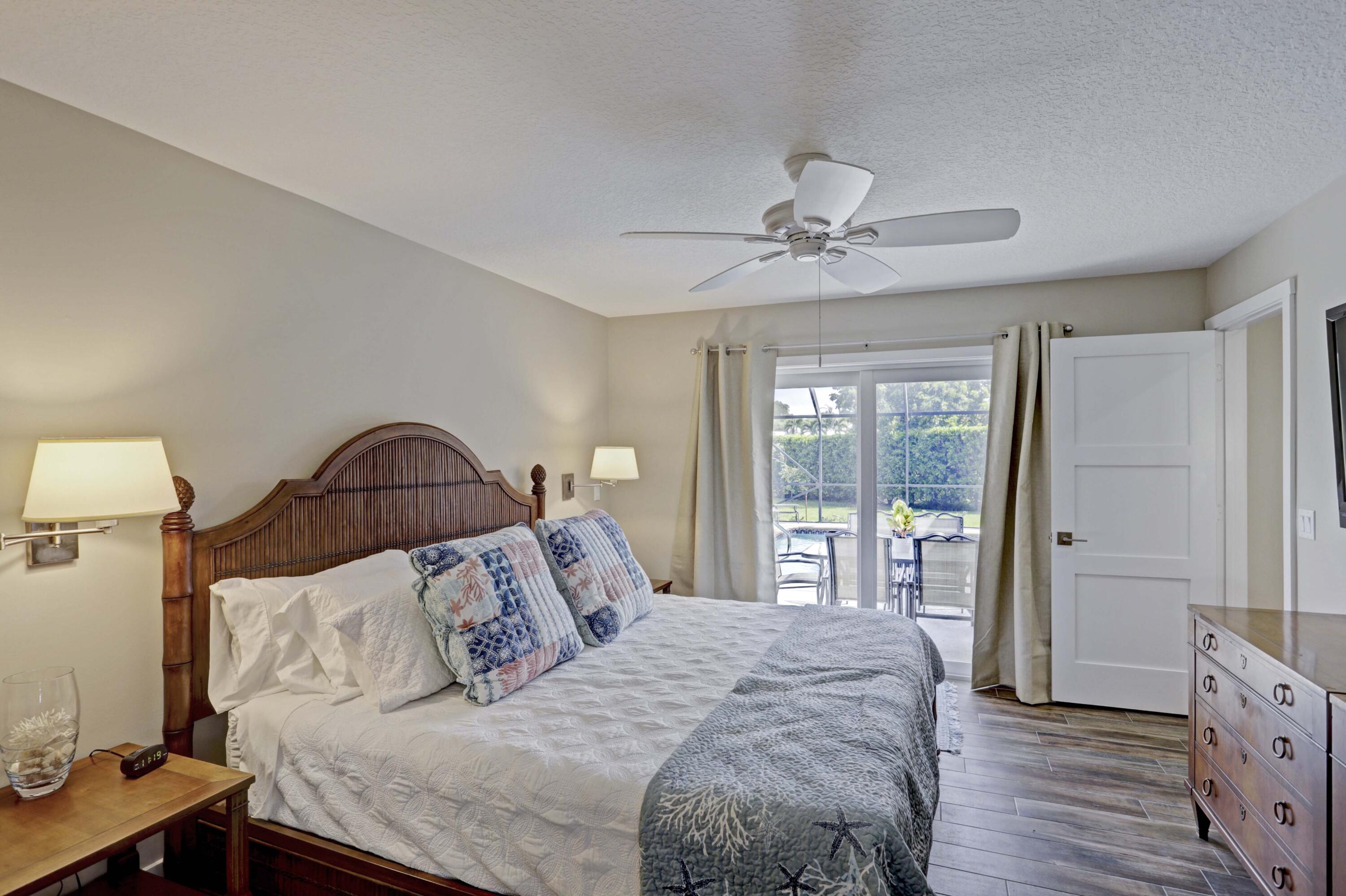 121 Wandering Trail Jupiter, FL 33458 - Photo 18 of 52 Master Bedroom w/King Bed