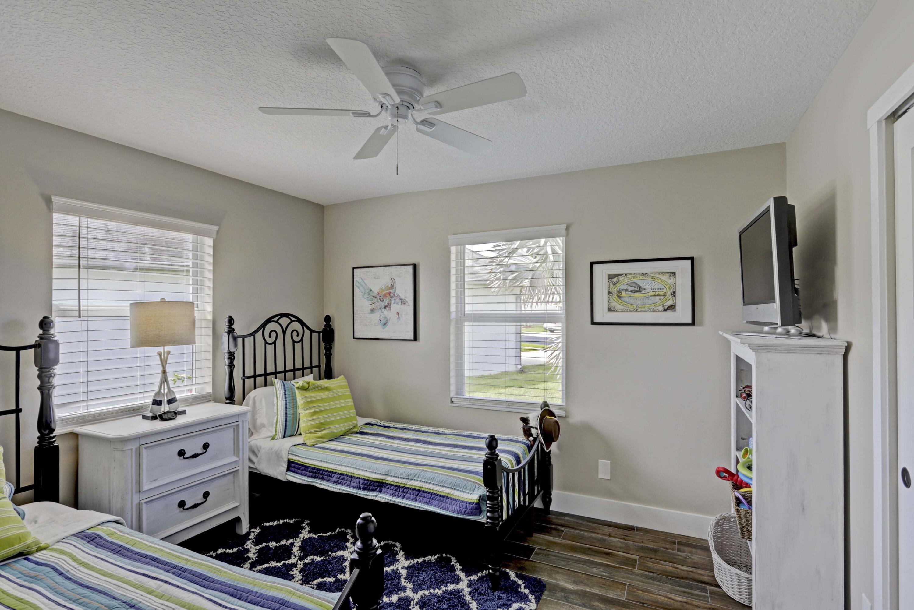 121 Wandering Trail Jupiter, FL 33458 - Photo 25 of 52 Guest Room 1 with 2 twin beds