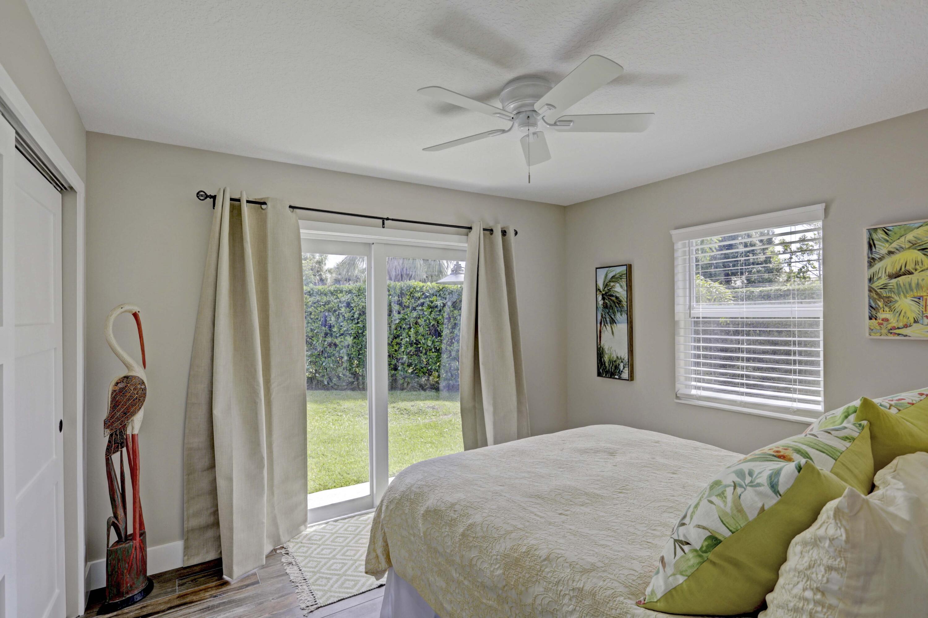 121 Wandering Trail Jupiter, FL 33458 - Photo 29 of 52 Guest Bedroom #2 with Queen Bed