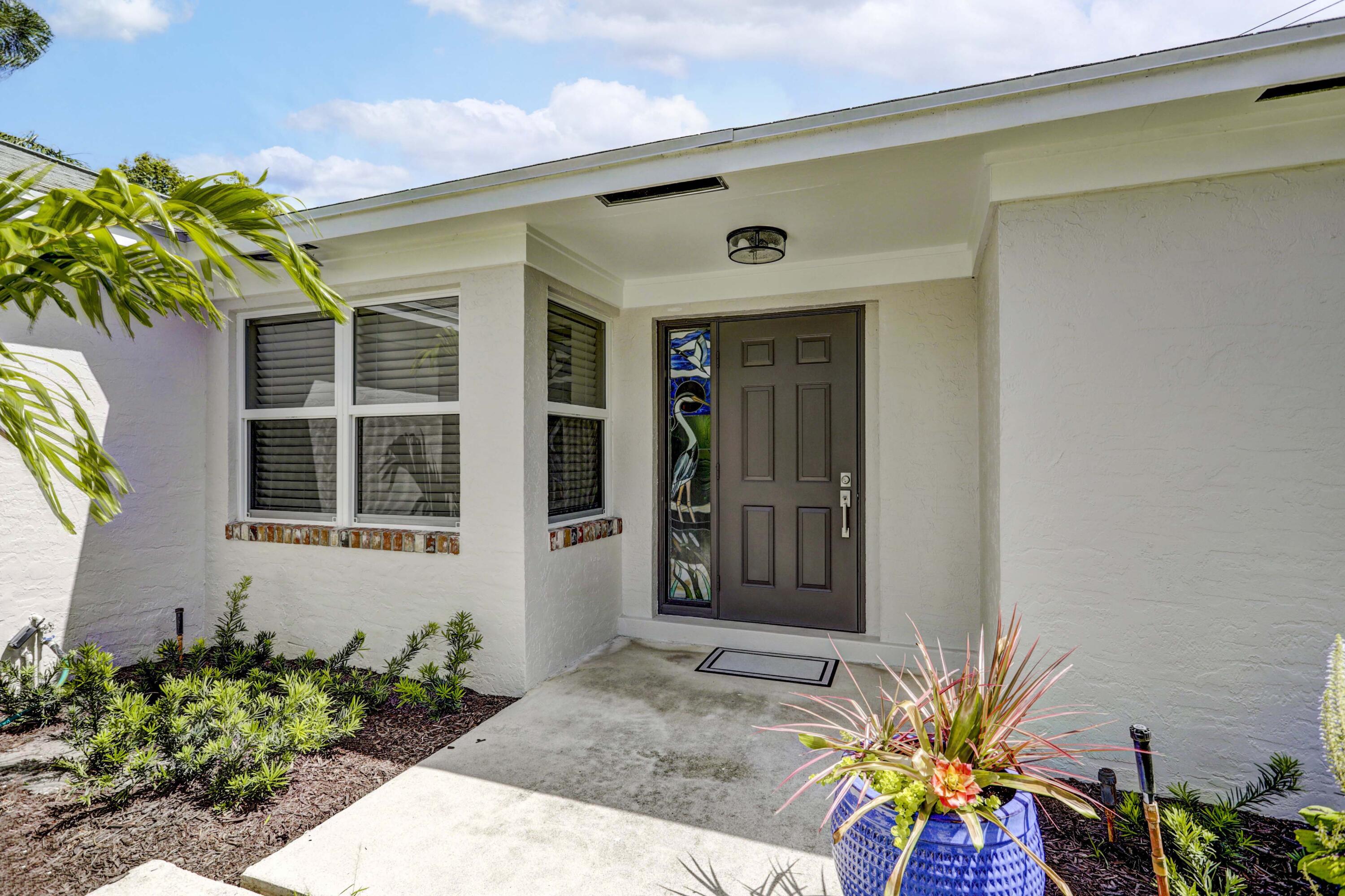 121 Wandering Trail Jupiter, FL 33458 - Photo 3 of 52 Front