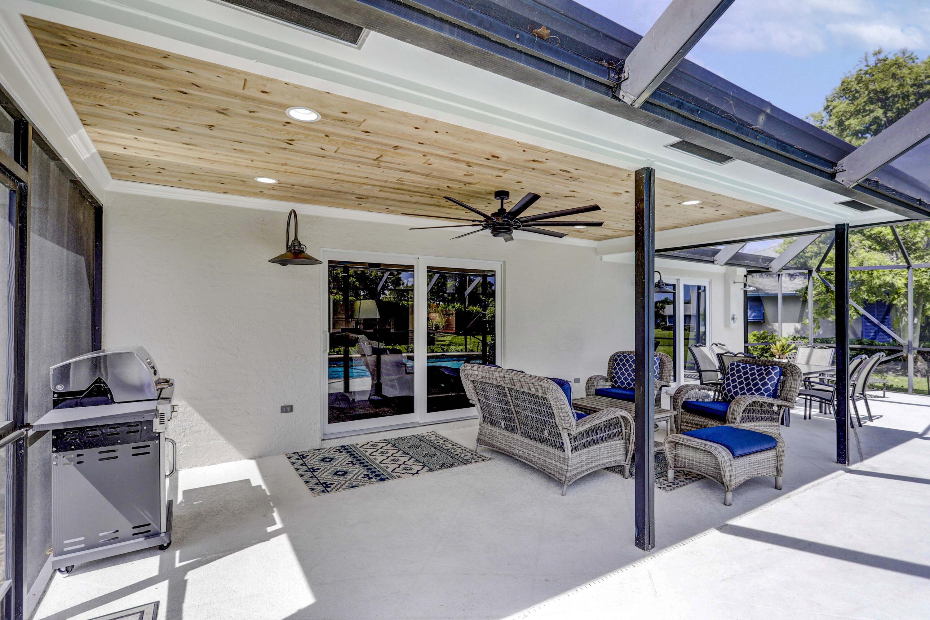 121 Wandering Trail Jupiter, FL 33458 - Photo 32 of 52 Covered Patio