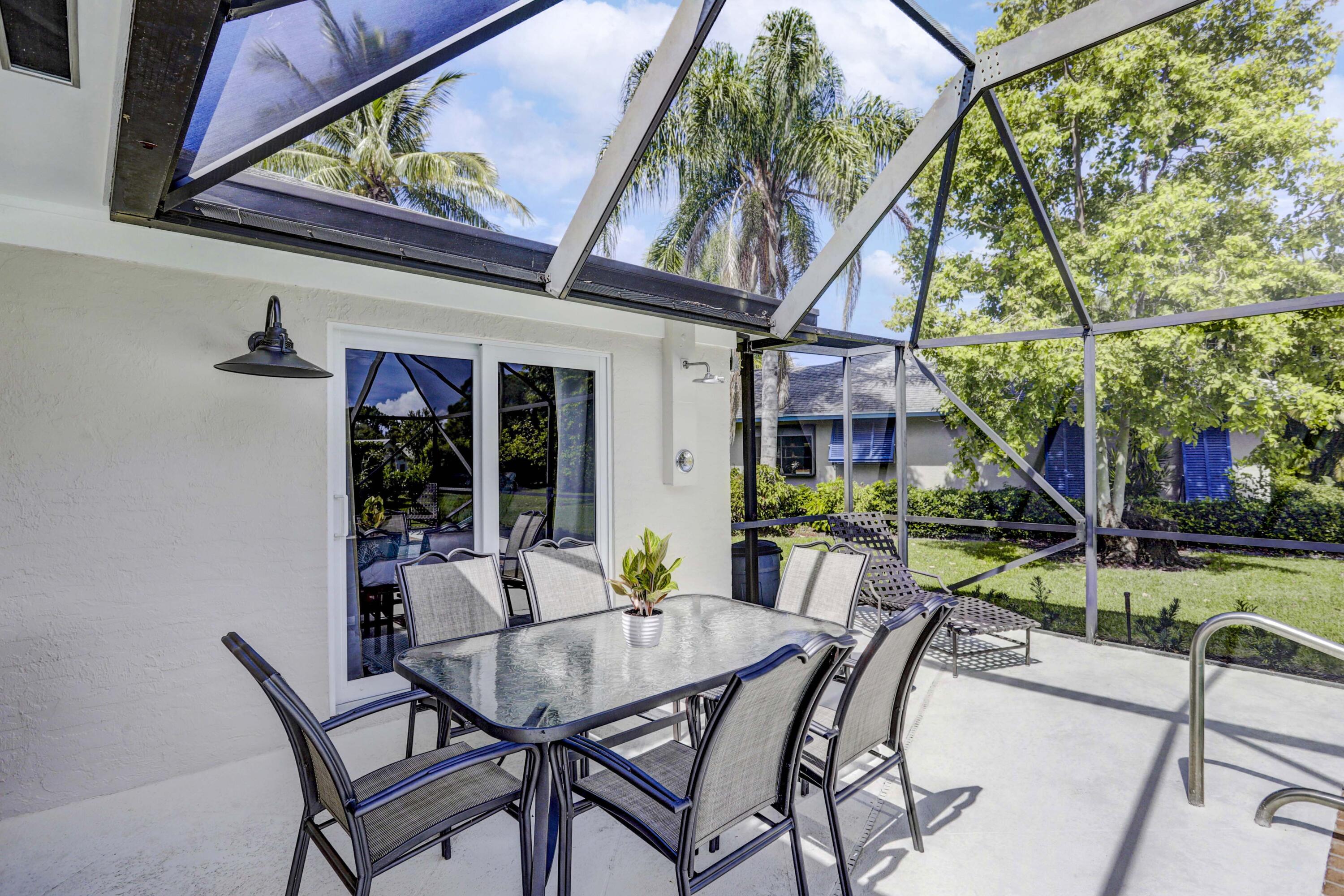 121 Wandering Trail Jupiter, FL 33458 - Photo 37 of 52 Dining on Patio