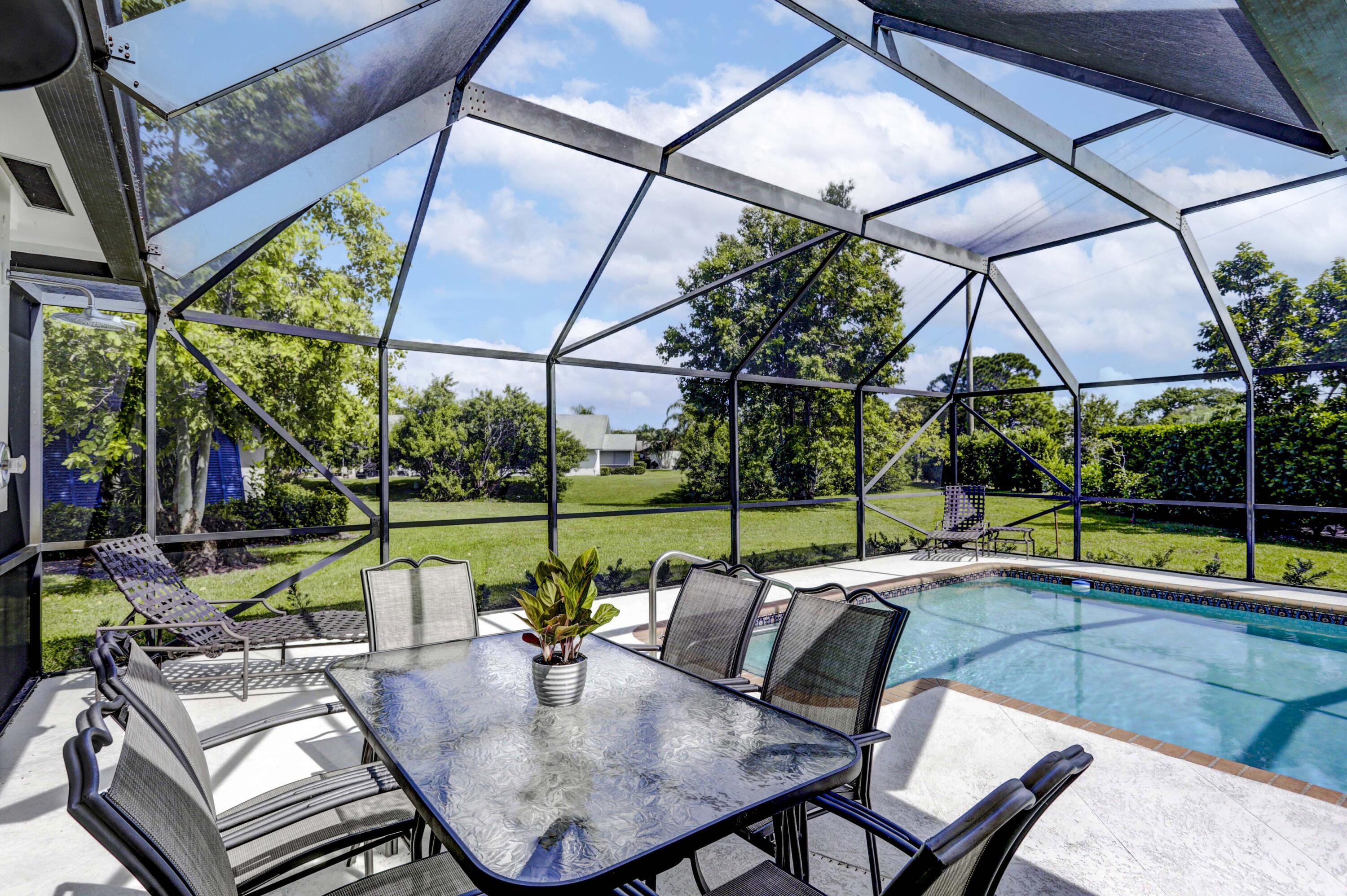 121 Wandering Trail Jupiter, FL 33458 - Photo 38 of 52 Screened Patio