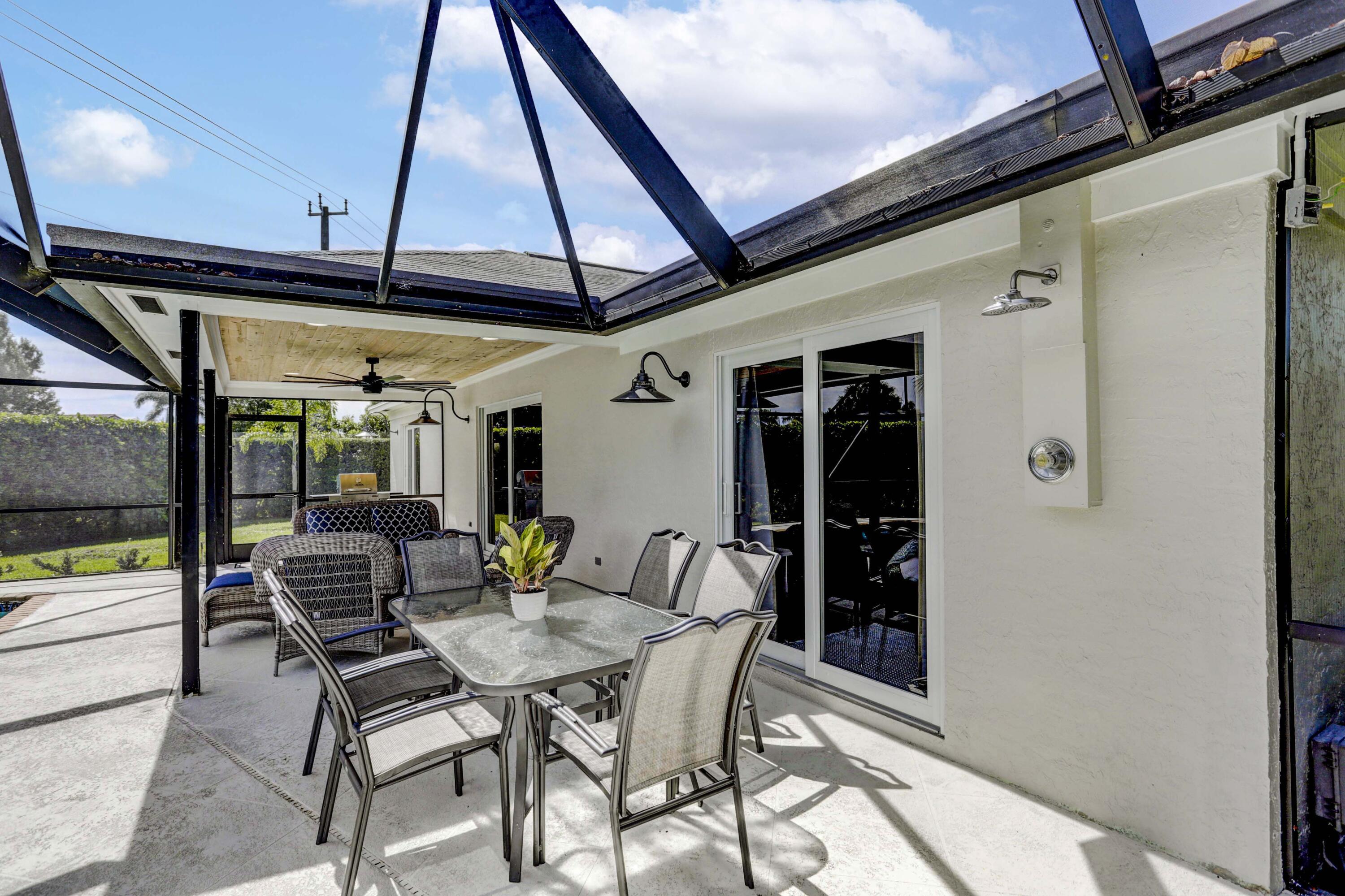 121 Wandering Trail Jupiter, FL 33458 - Photo 40 of 52 Outdoor Shower!