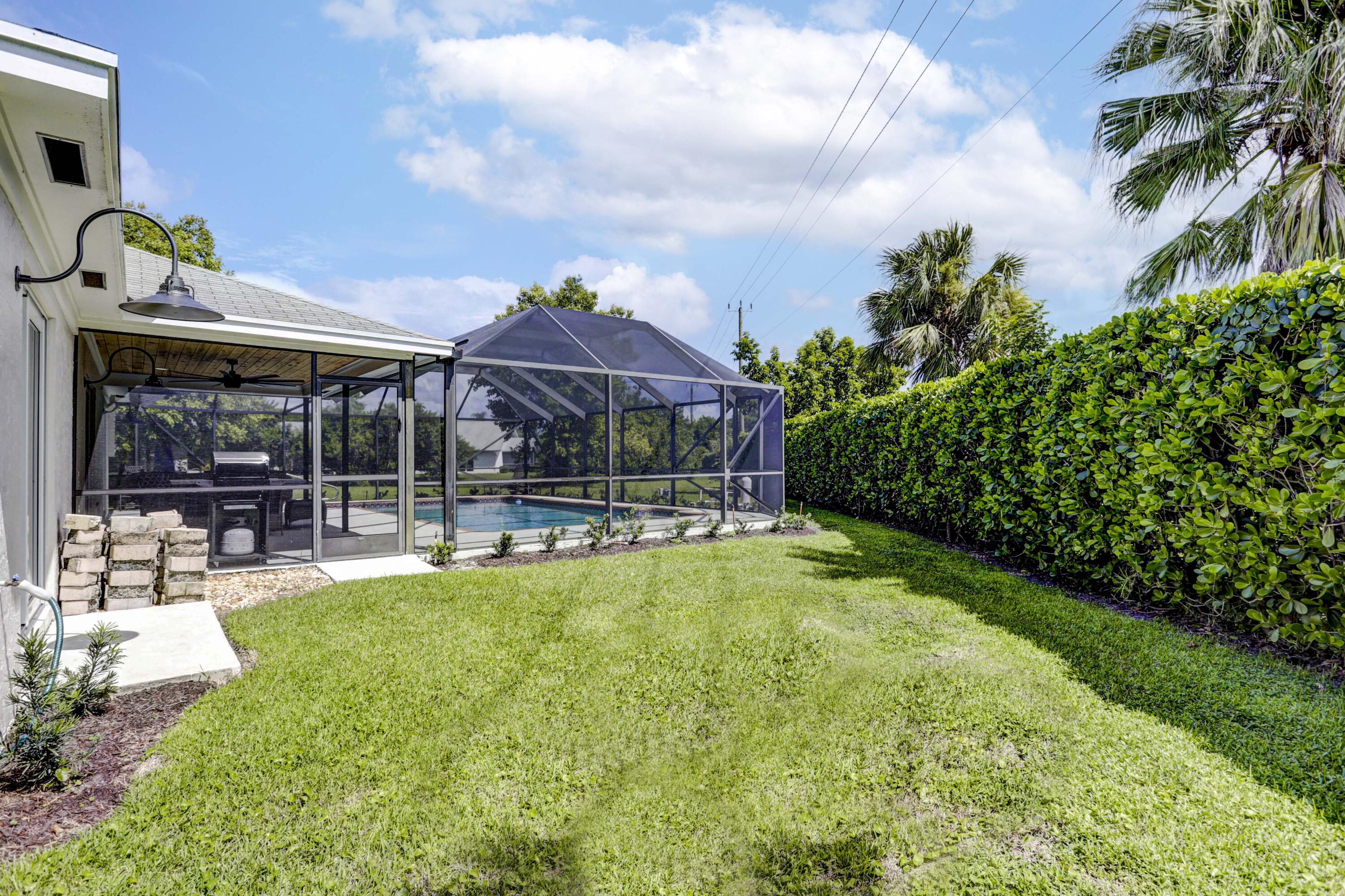 121 Wandering Trail Jupiter, FL 33458 - Photo 45 of 52 Side yard