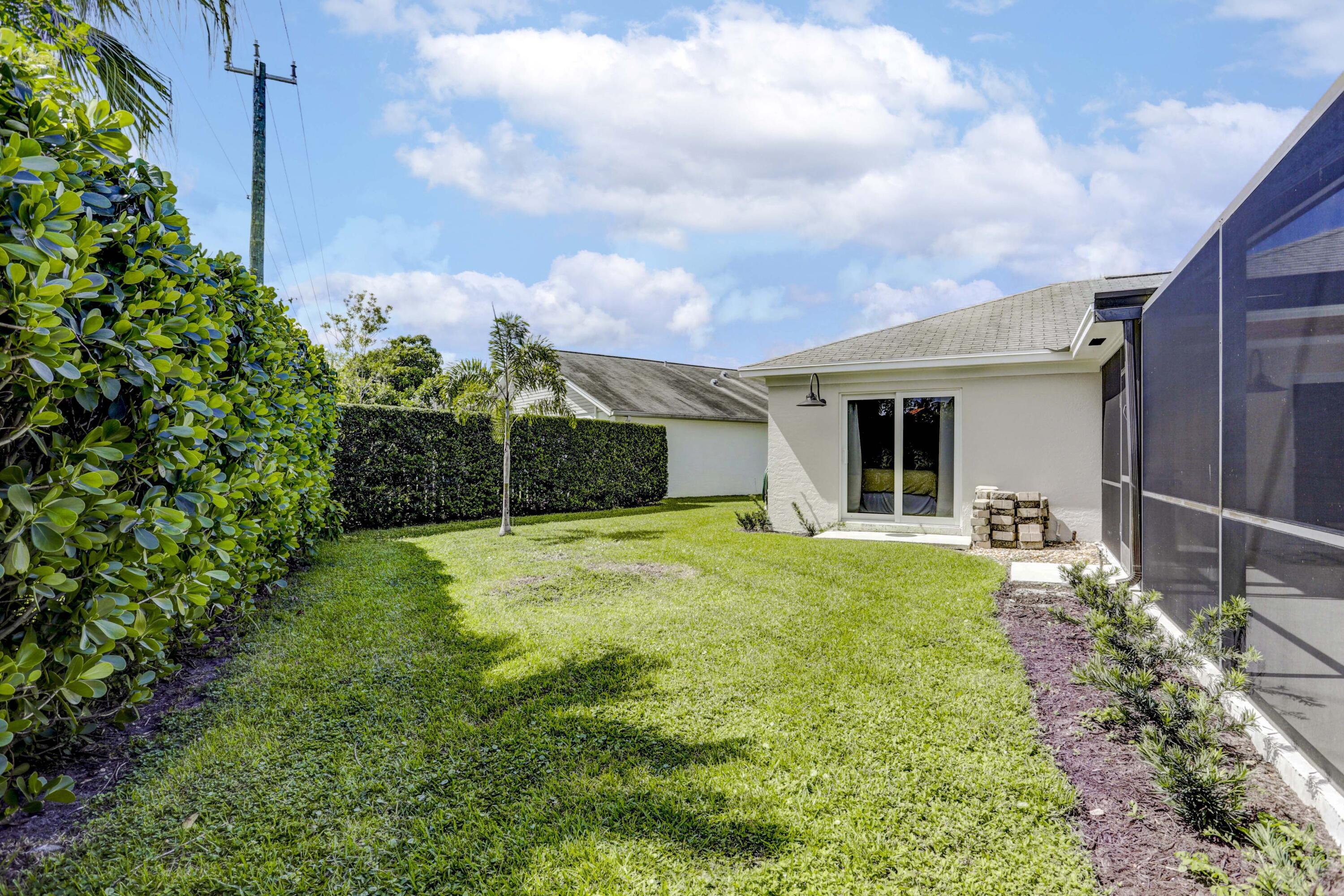121 Wandering Trail Jupiter, FL 33458 - Photo 46 of 52 Side yard