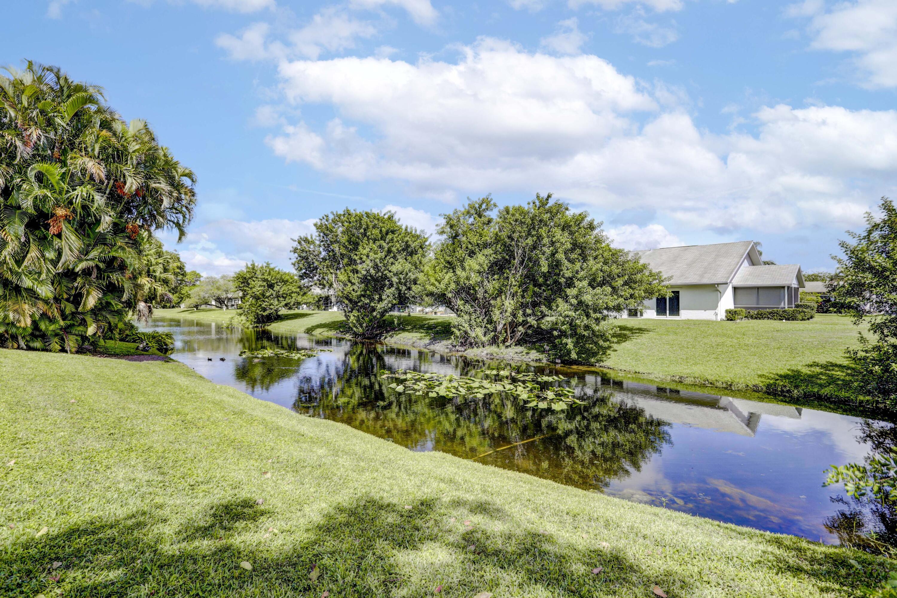 121 Wandering Trail Jupiter, FL 33458 - Photo 51 of 52 pond off to the side