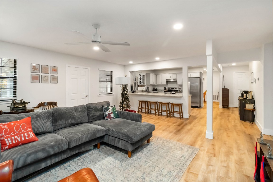 326 Pine View Loop Bastrop, TX 78602 - Photo 6 of 29 Living area with light wood finished floors, recessed lighting, and ceiling fan