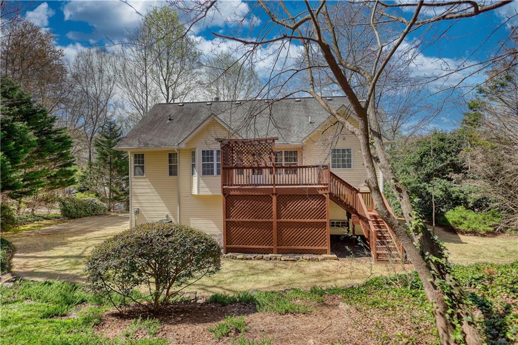 1006 English Oak Lane Winder, GA 30680 - Photo 68 of 83 a front view of a house with a yard and garage