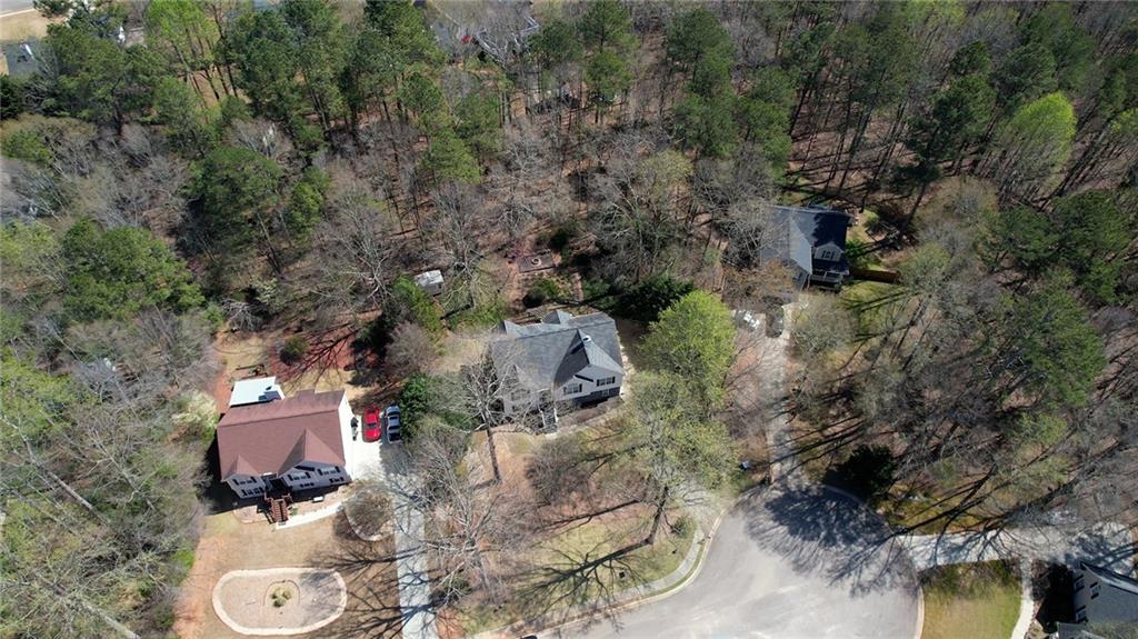 1006 English Oak Lane Winder, GA 30680 - Photo 79 of 83 an aerial view of a house with a yard