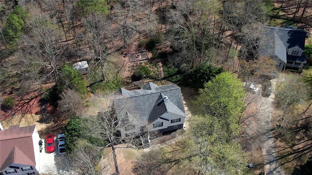 1006 English Oak Lane Winder, GA 30680 - Photo 80 of 83 an aerial view of a house with a yard