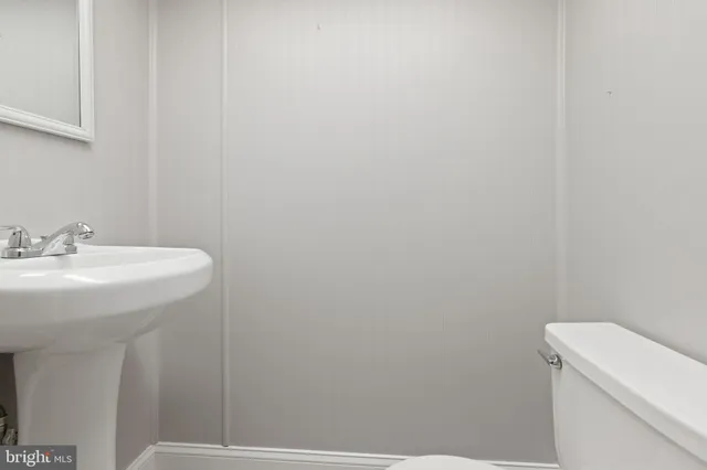 a bathroom with a sink and a toilet