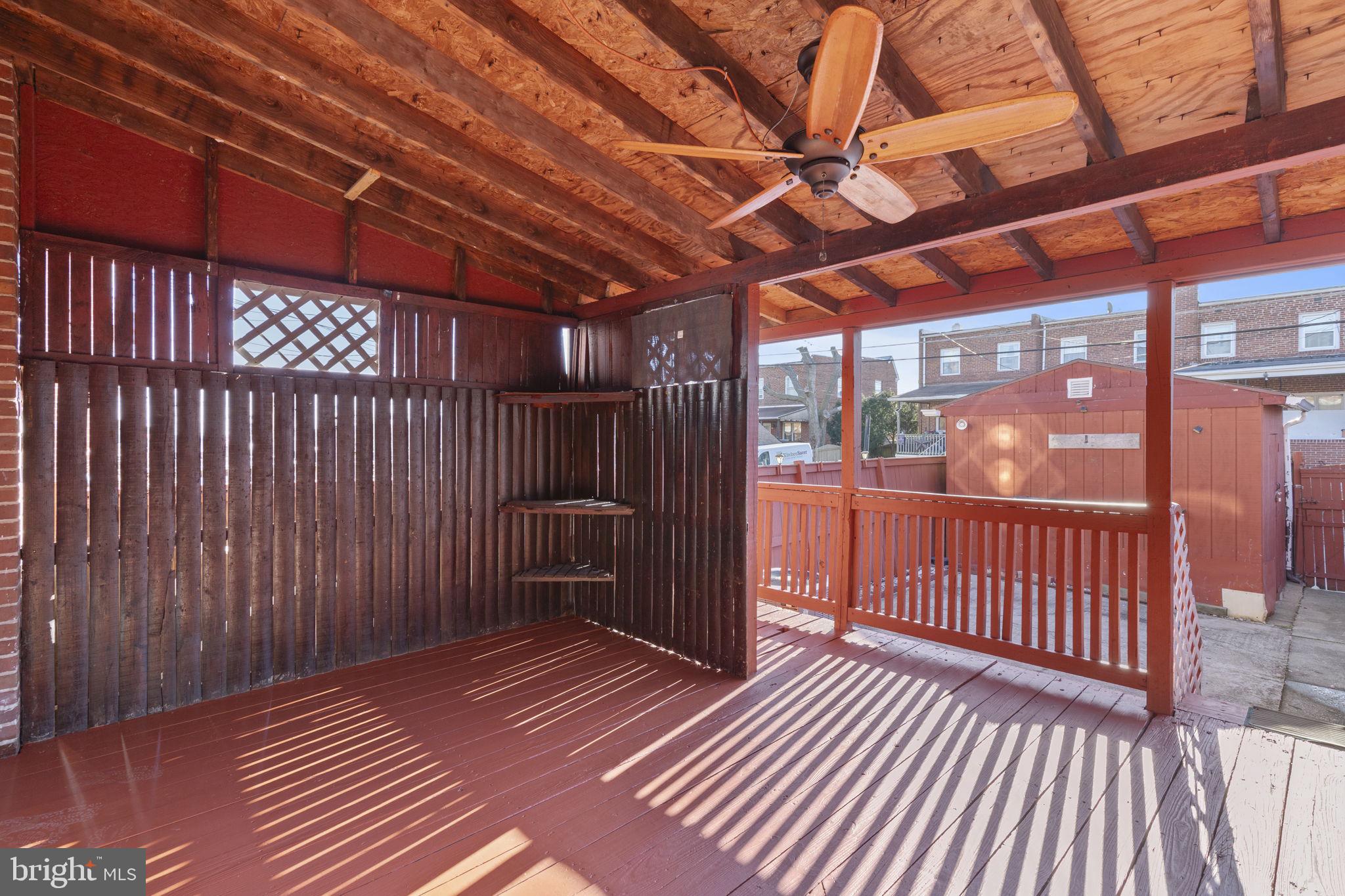 7731 Eastdale Road Baltimore, MD 21224 - Photo 21 of 26 a view of a balcony with wooden floor