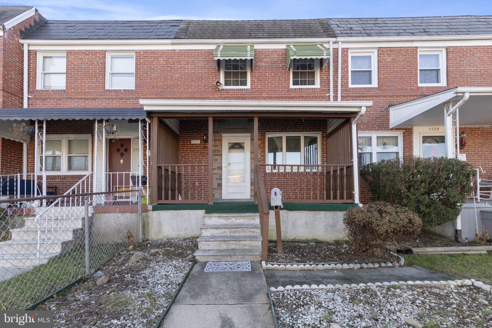 7731 Eastdale Road Baltimore, MD 21224 - Photo 4 of 26 a front view of a house with garden