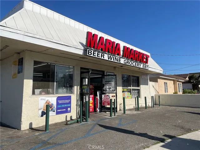 a view of a shop with a lot of signs