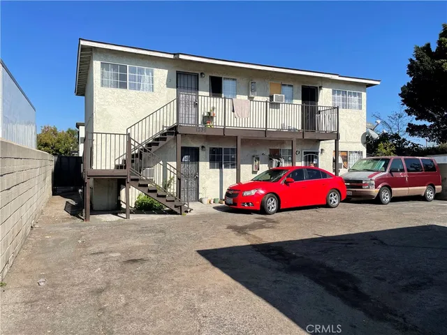 a view of a car in front of house