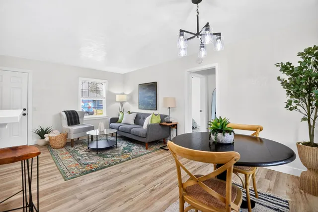 a work room with furniture and wooden floor