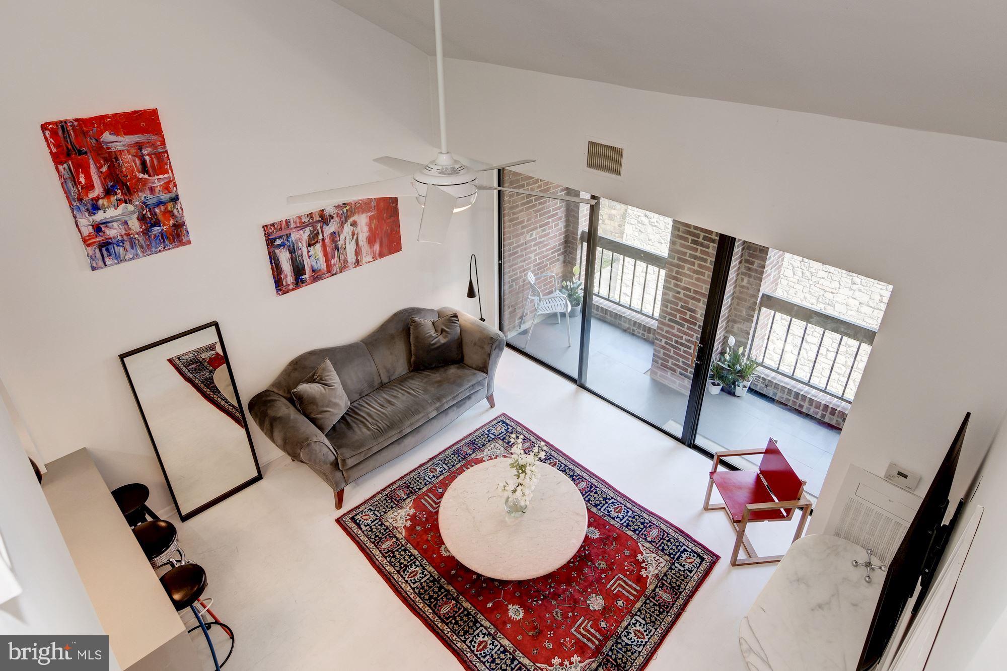 3225 Grace Street Northwest, Unit 208 Washington, DC 20007 - Photo 2 of 16 High ceilings w/exposed beams