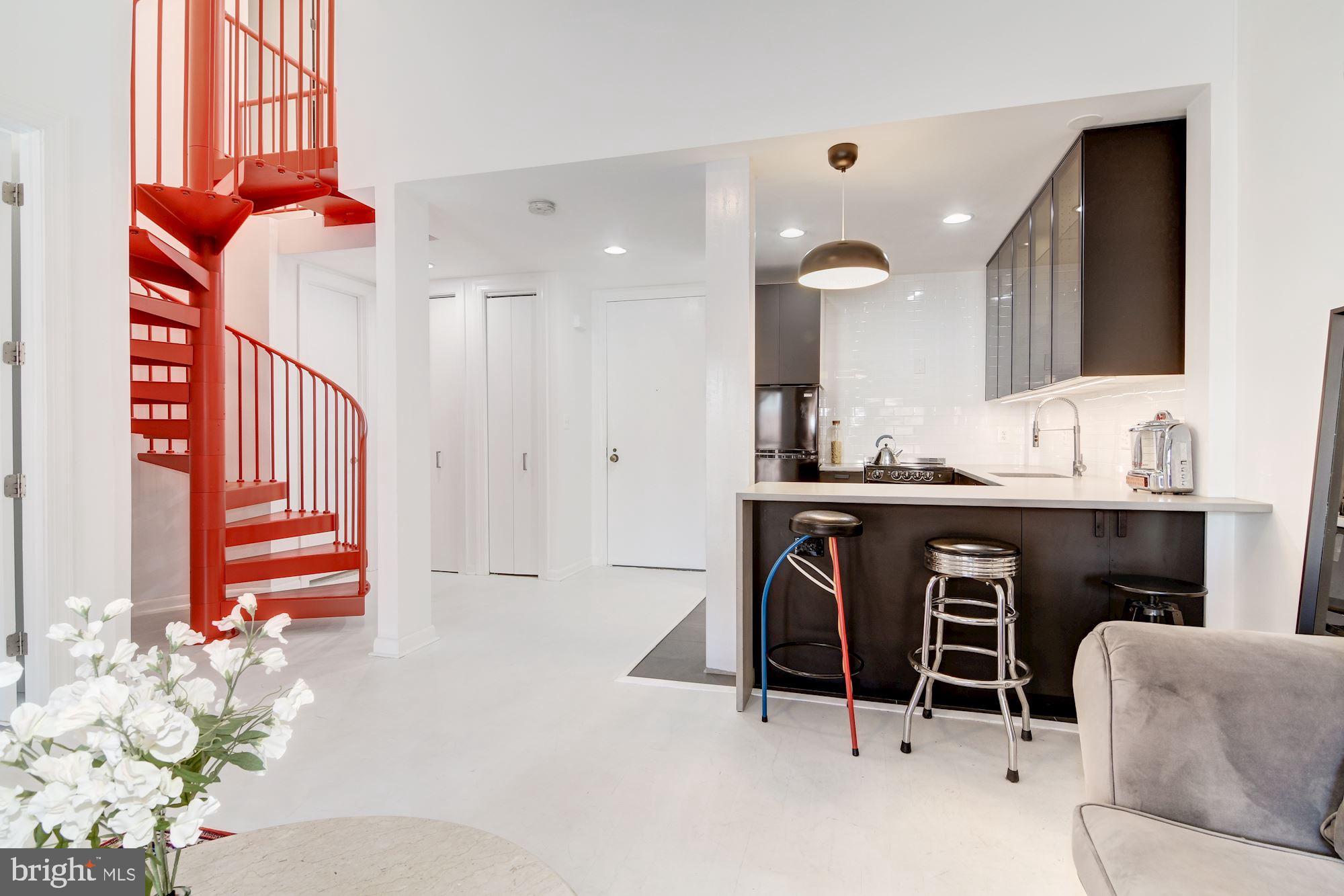 3225 Grace Street Northwest, Unit 208 Washington, DC 20007 - Photo 3 of 16 Custom spiral staircase